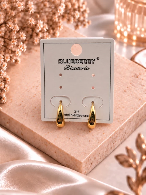 Elegancka biżuteria BLUEBERRY na różowym kamieniu.png